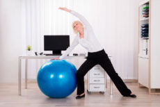 10 Ways to Stay Healthy If You Work at a Computer All Day-yoga ball exercise stretch